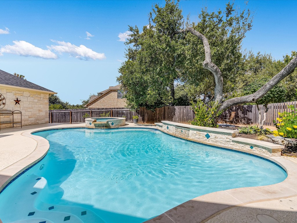 a view of a house with swimming pool