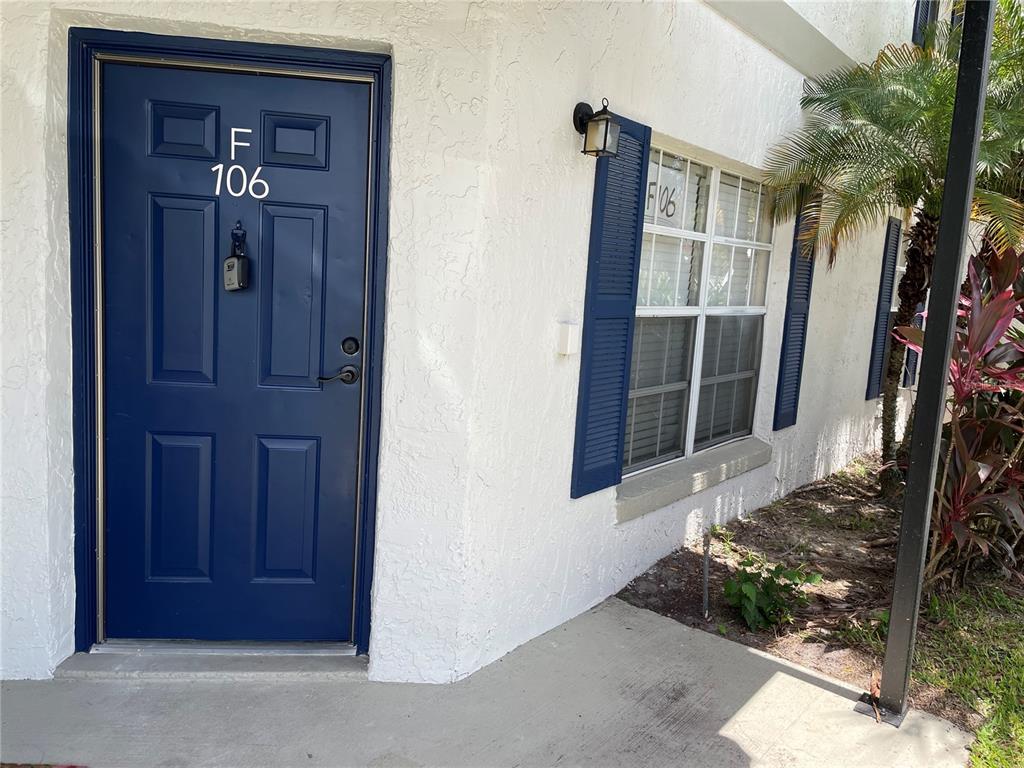 front view of a door with wooden door