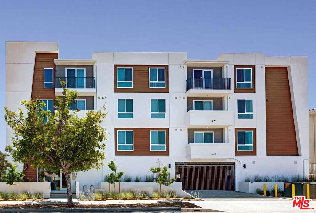 a front view of a building with street view