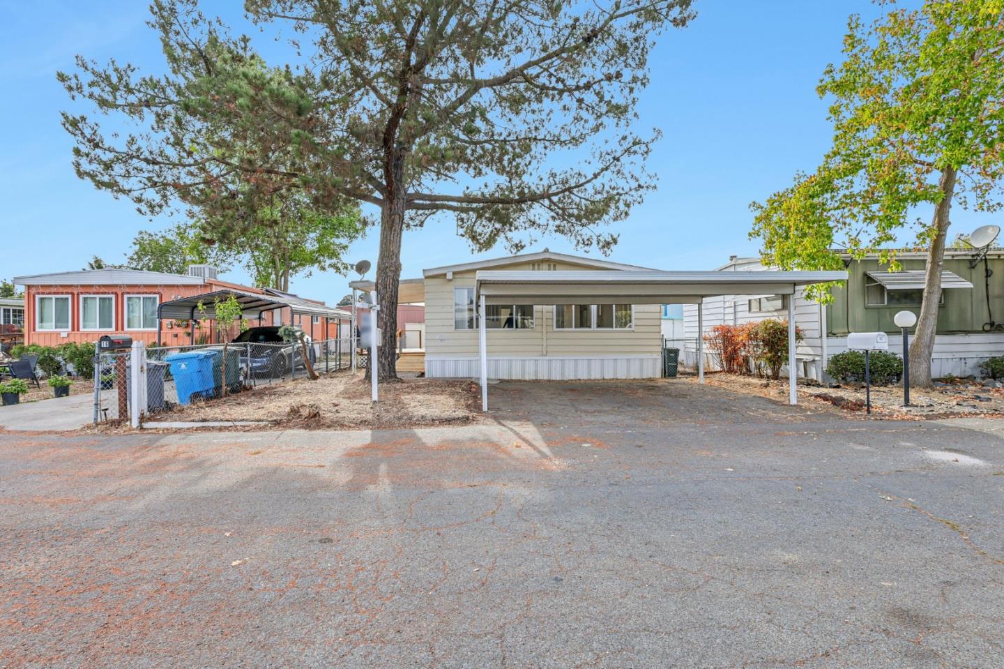 a view of house with outdoor space and a street