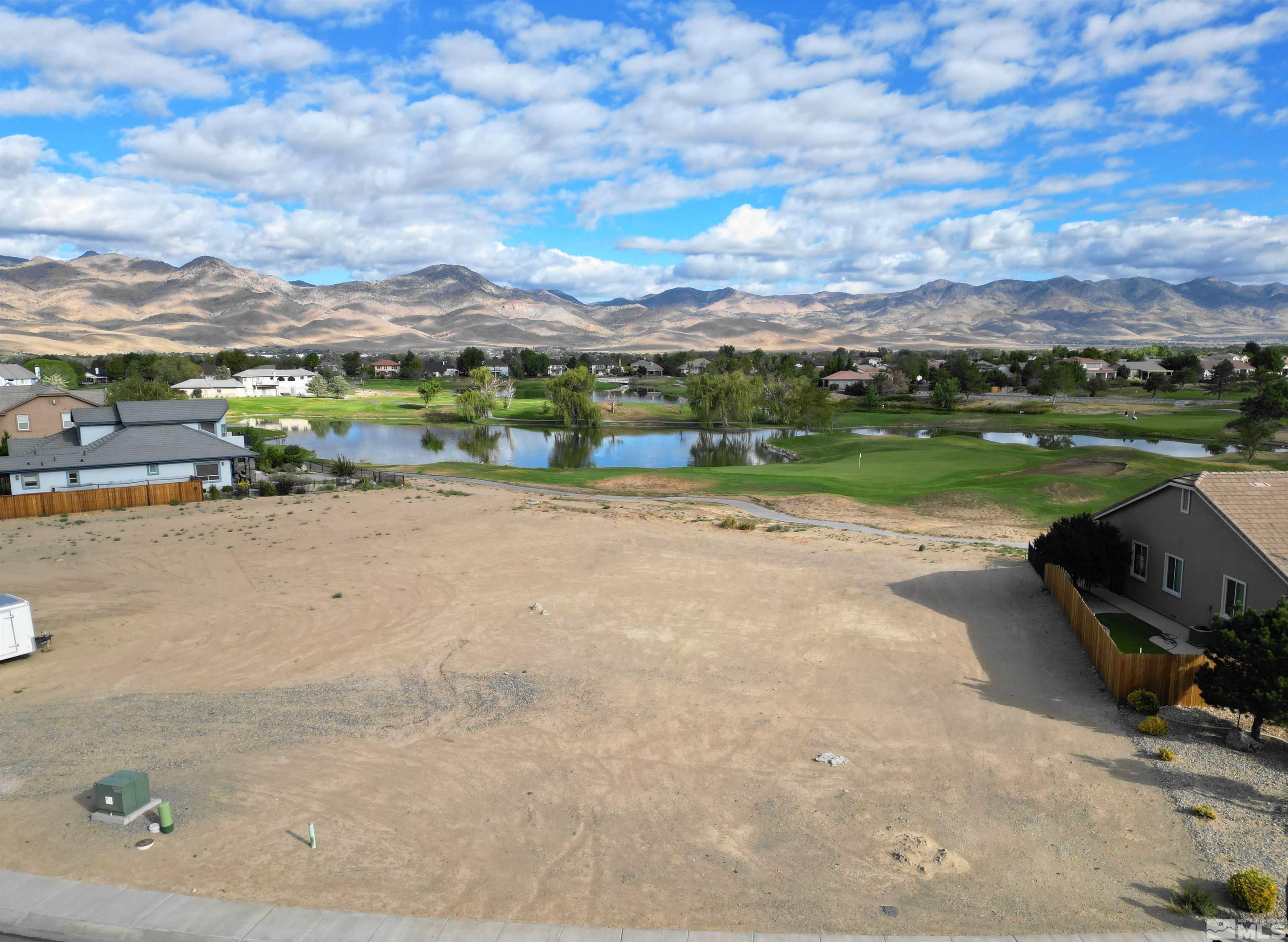 a view of a lake with outdoor space