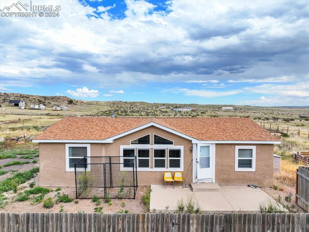 a view of a yard in front of a house with a yard