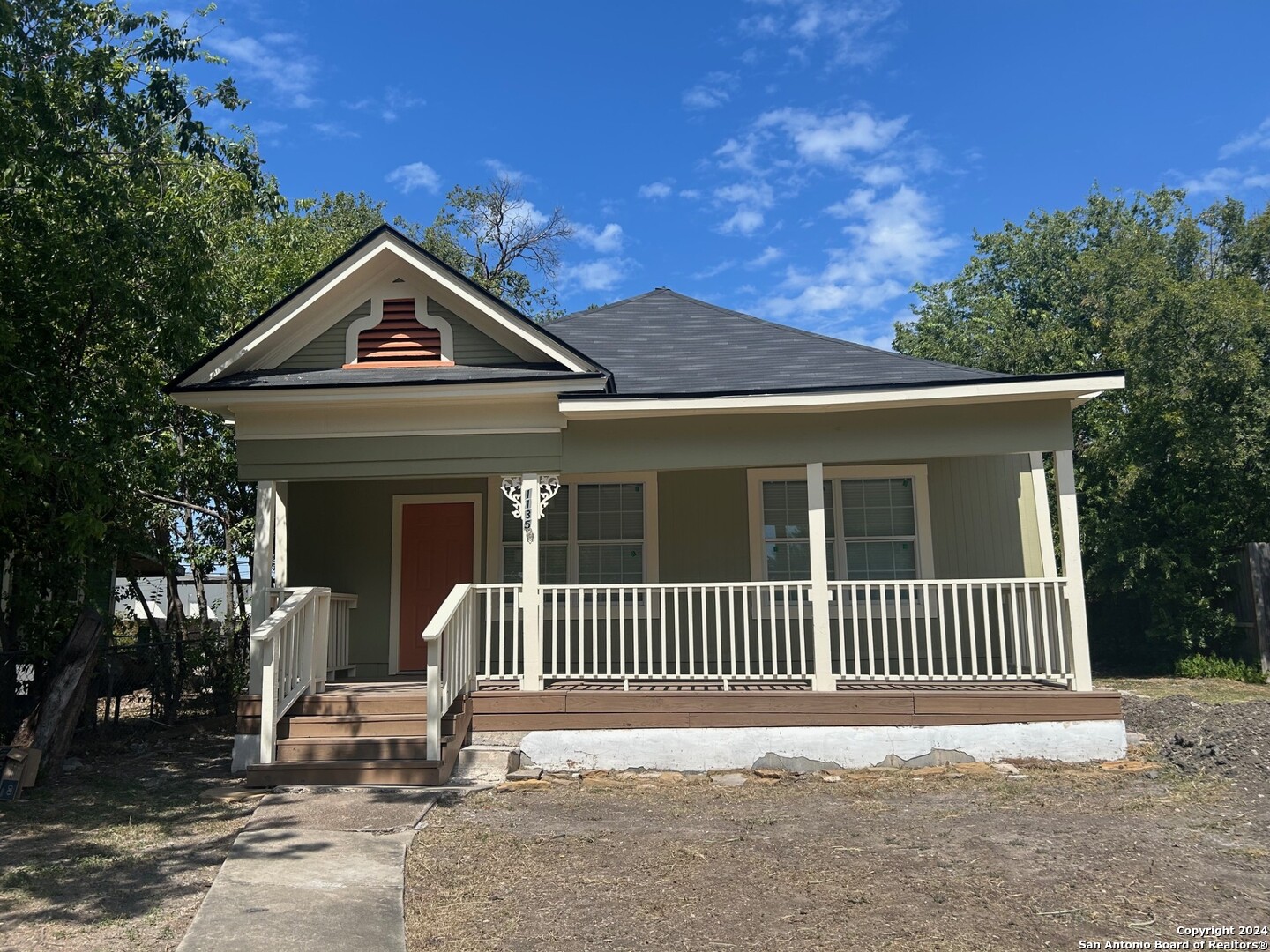 a front view of a house with a porch