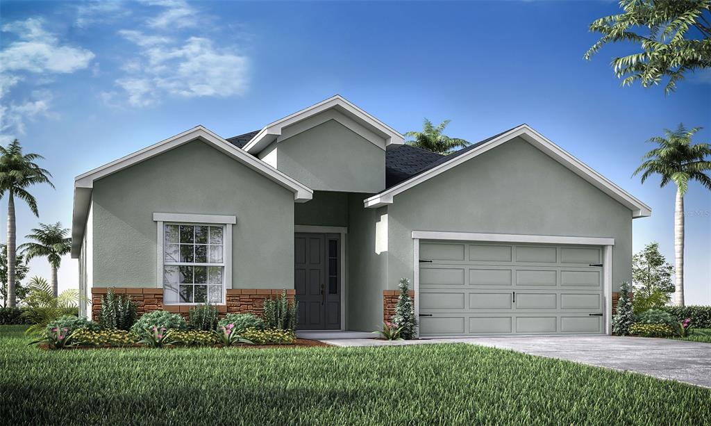 a front view of house with yard and green space