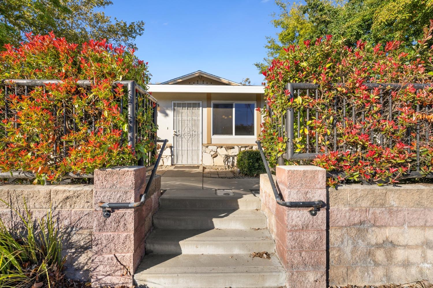 a view of house with outdoor space and seating