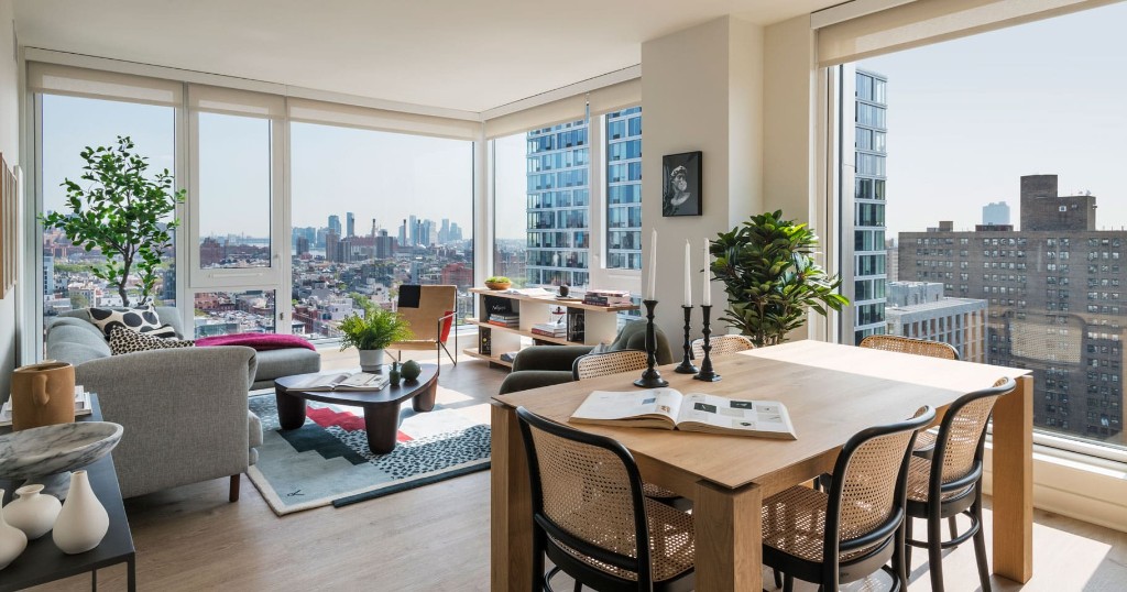 a view of a dining room with furniture window and outside view