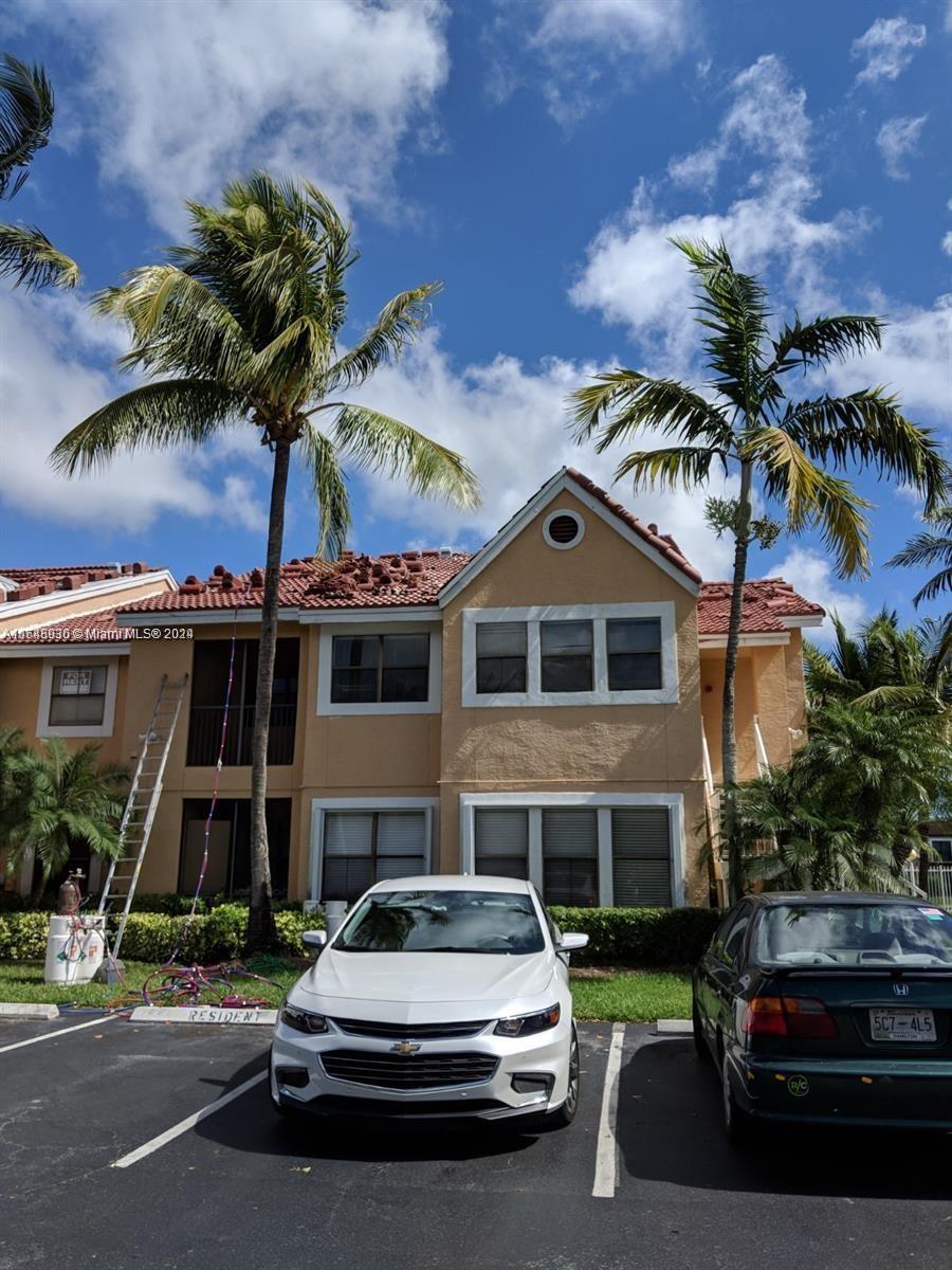 a car parked in front of a house