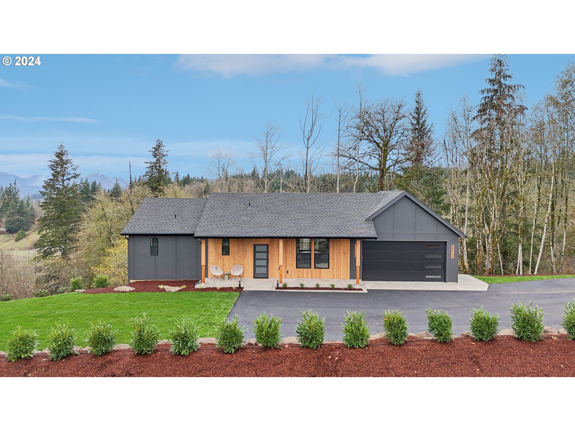 a house view with a garden space