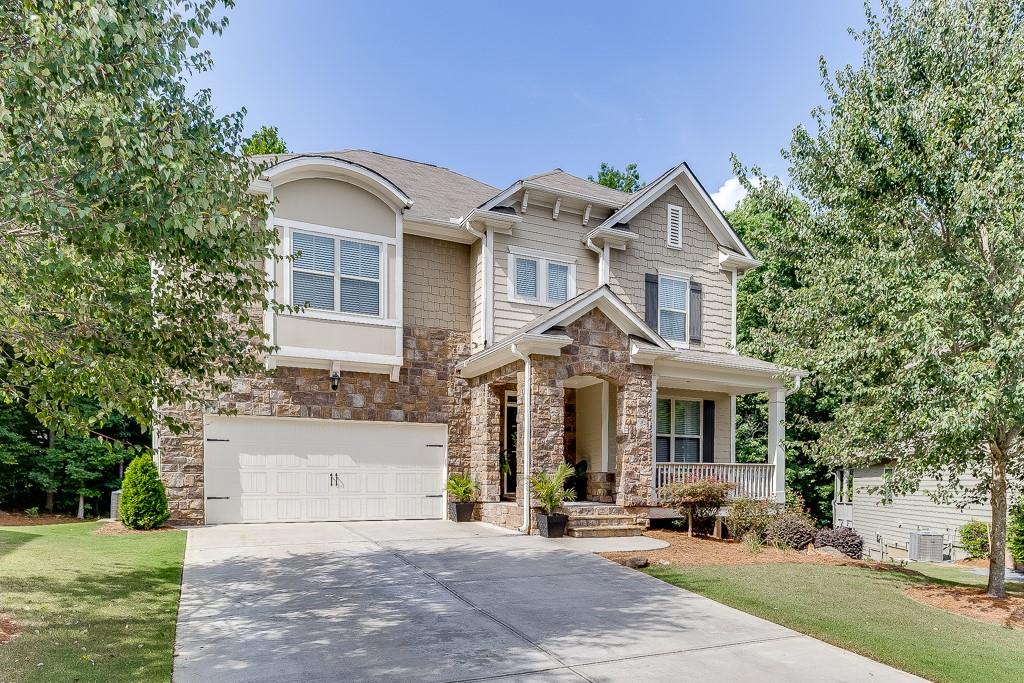 front view of a house with a yard