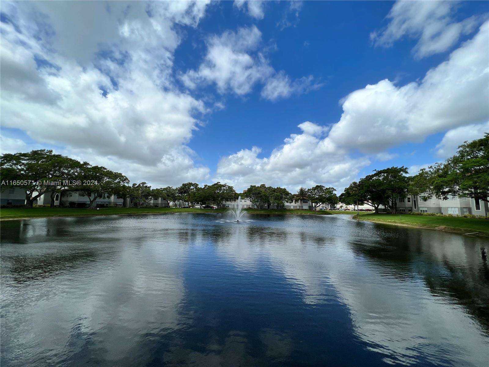 a view of a lake with houses