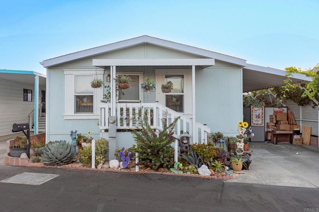 front view of a house with a patio