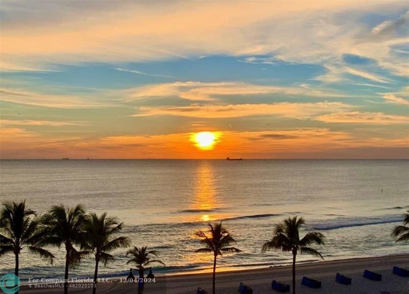 a view of a ocean and beach