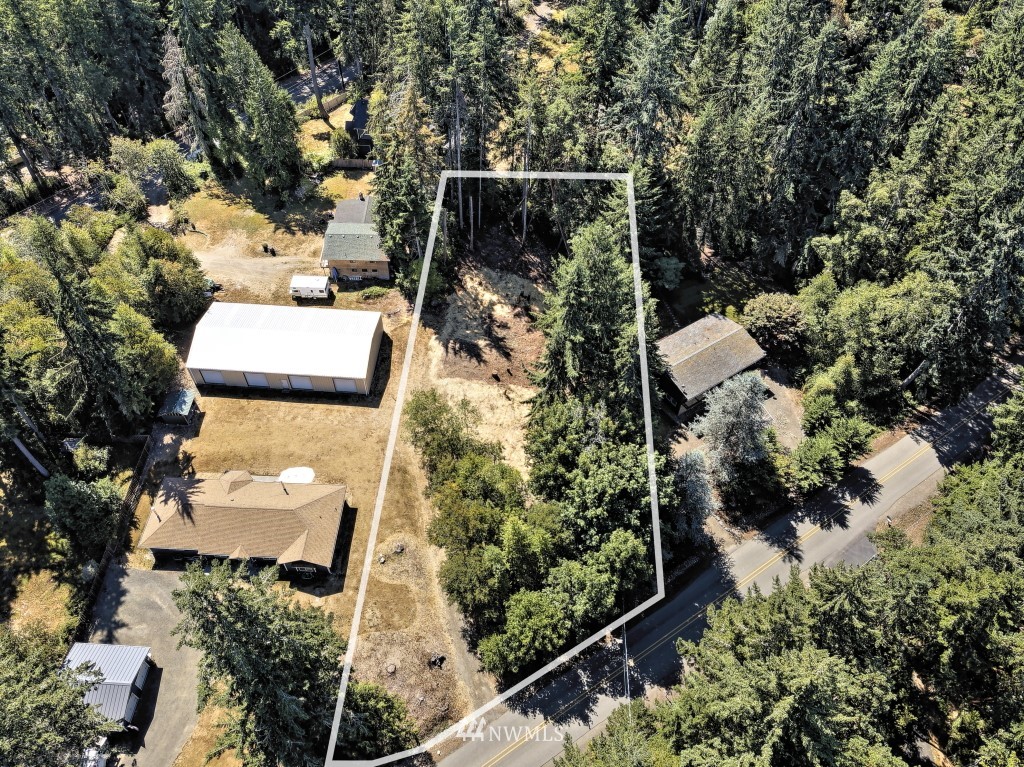 an aerial view of residential house with outdoor space