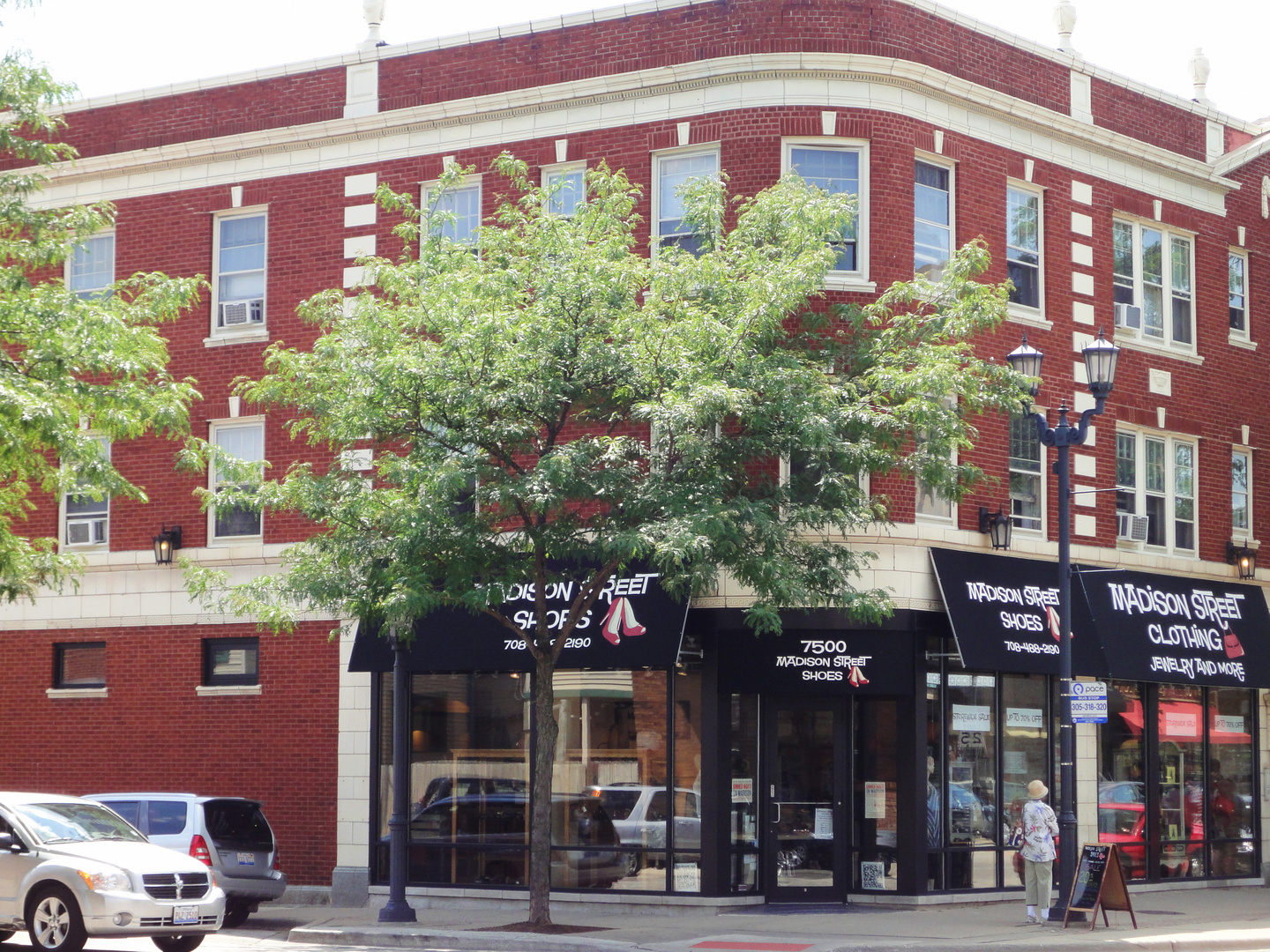 a front view of a building and a yard