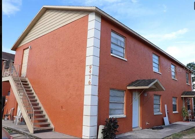 a front view of a house with street