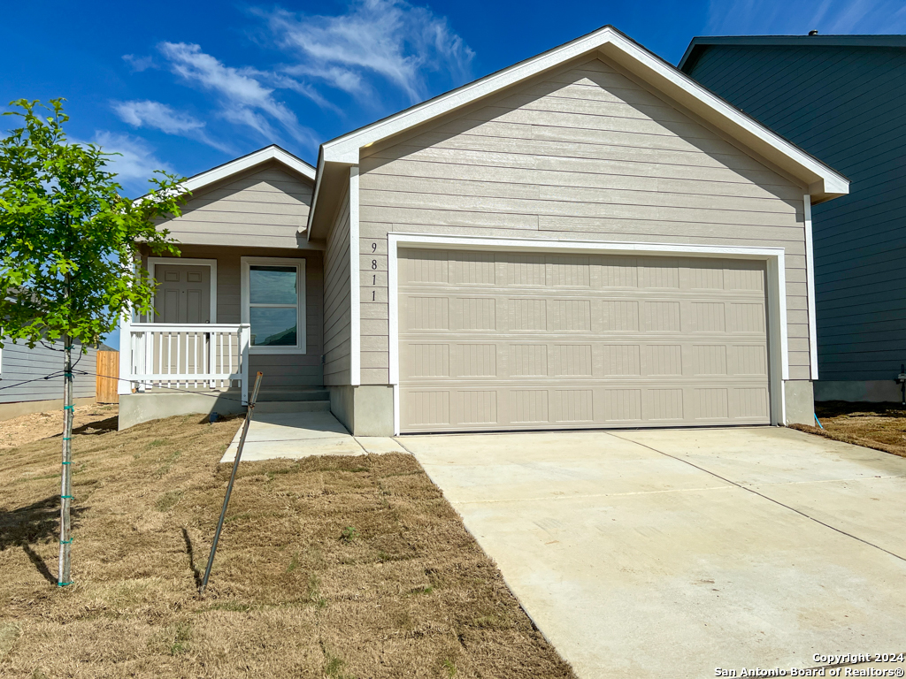 a house with trees in the background