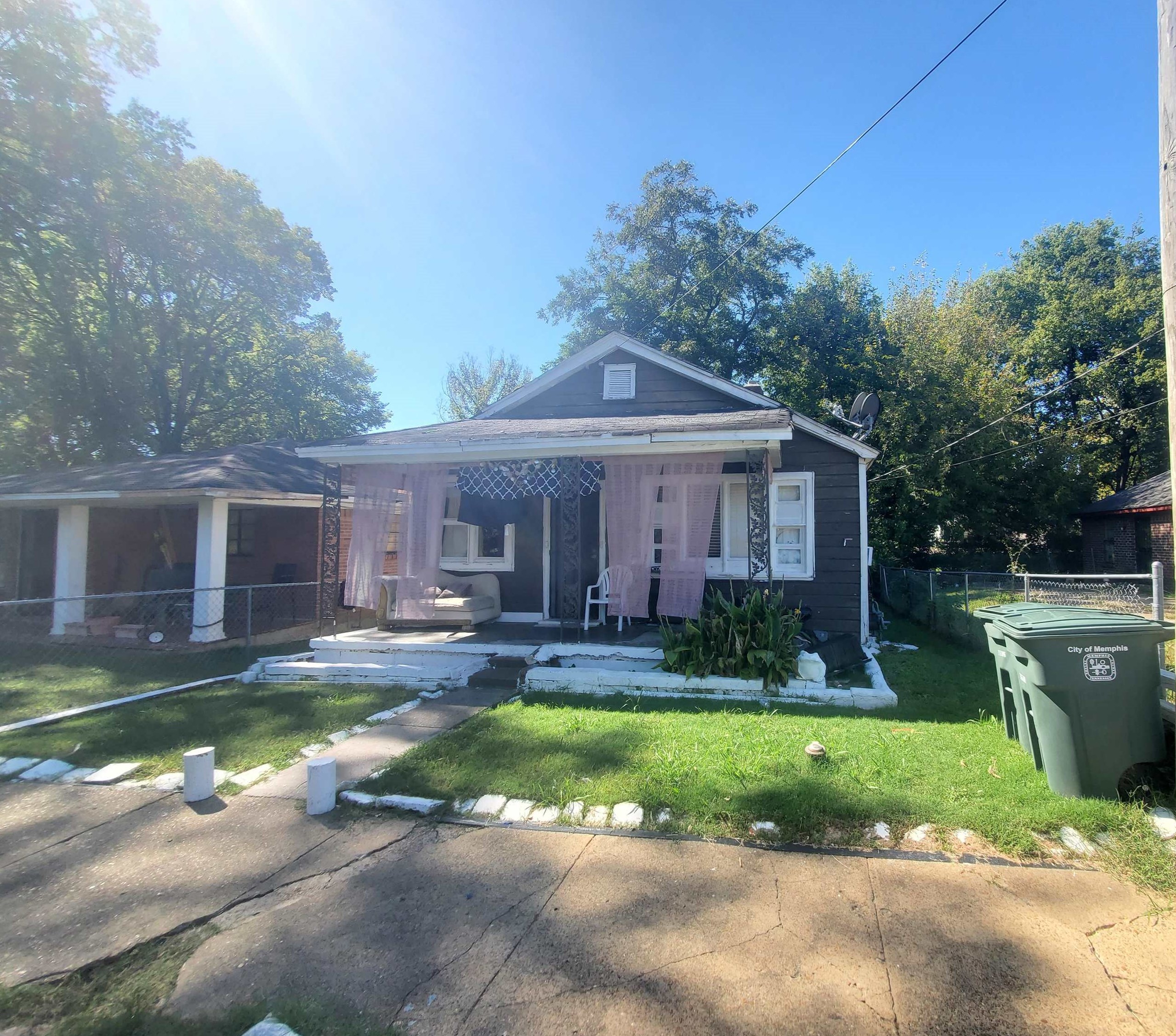 Bungalow-style home featuring a front yard