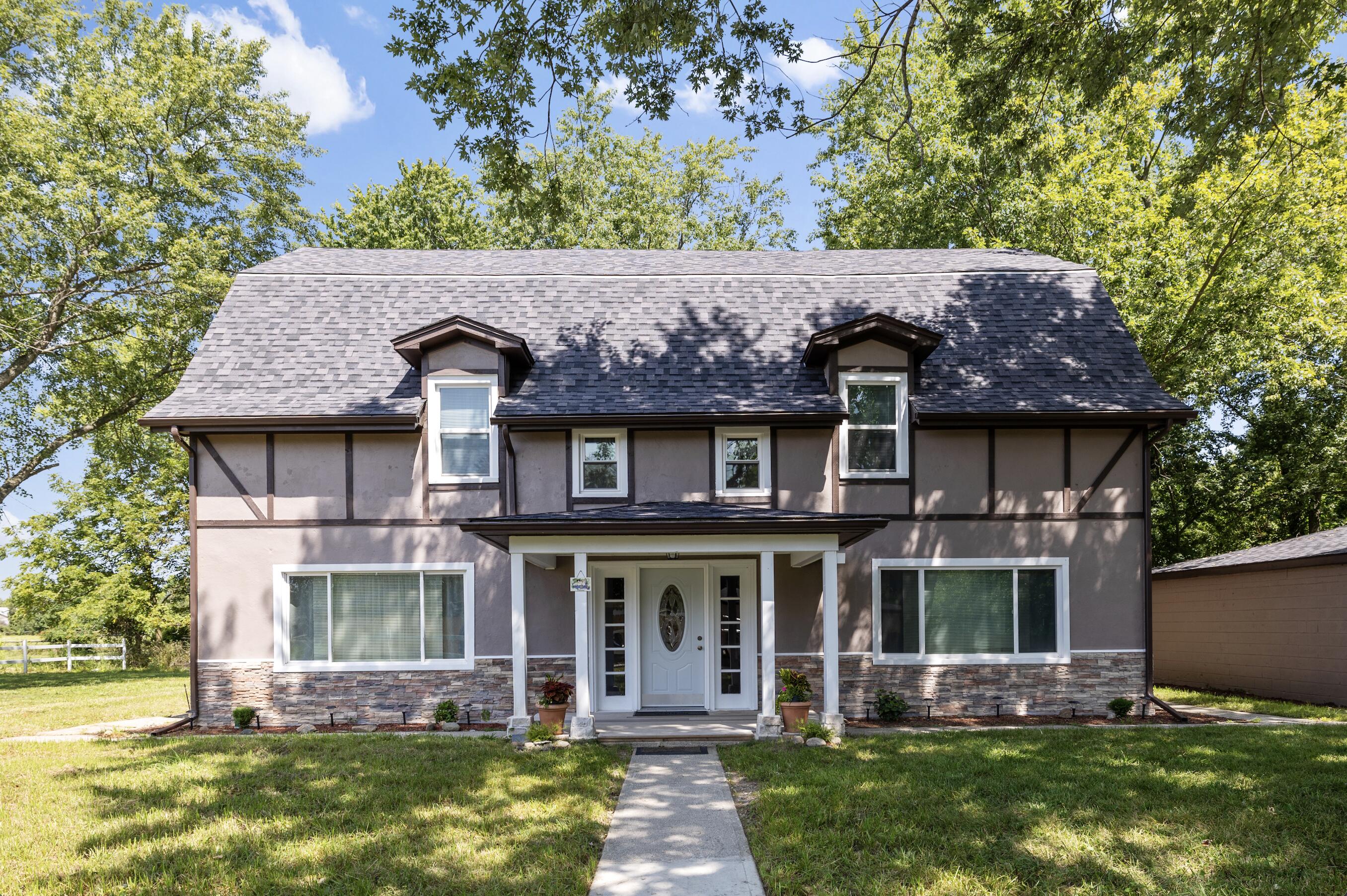 front view of house with a yard