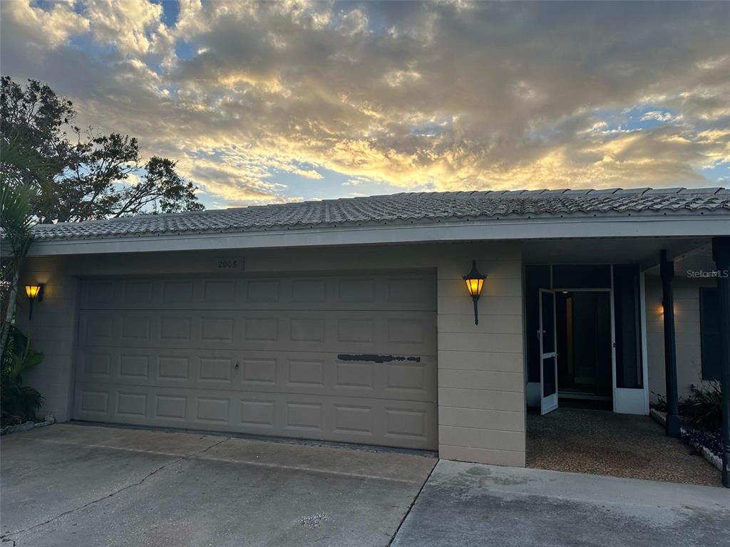 a view of outdoor space garage and window