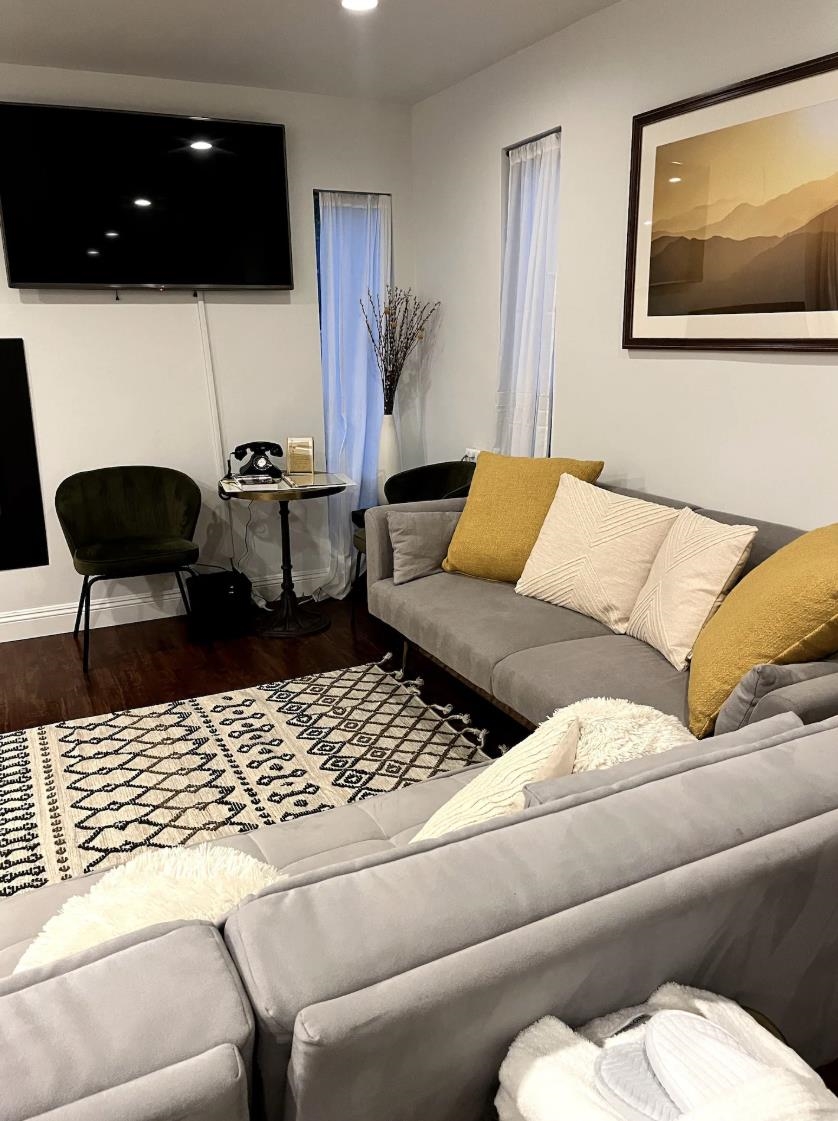 a living room with furniture and a couch