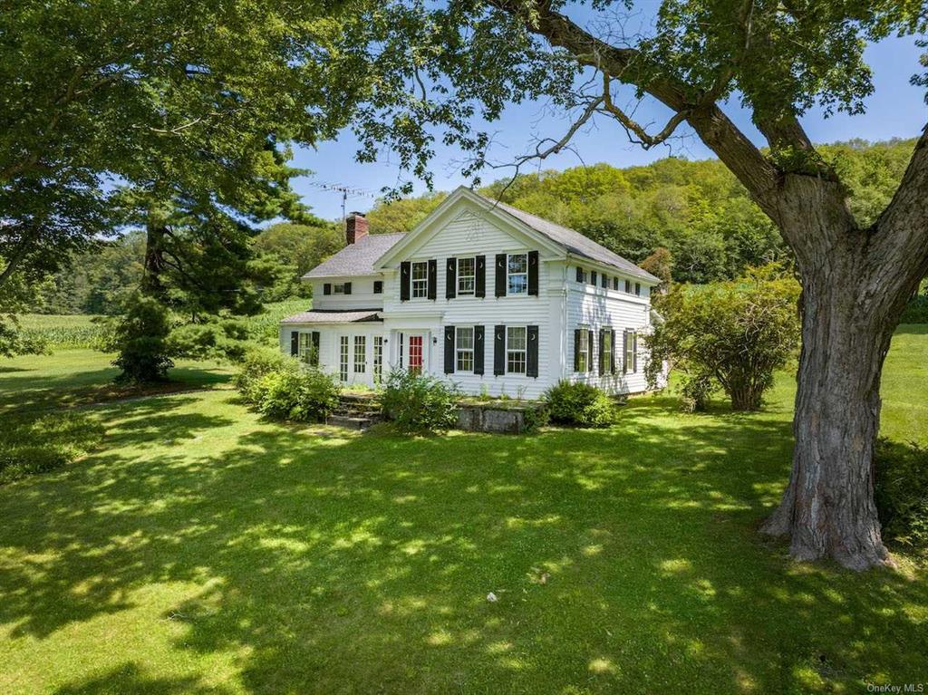 a house view with a garden space