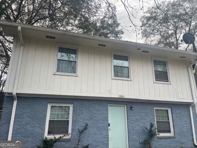 a front view of a house with garage