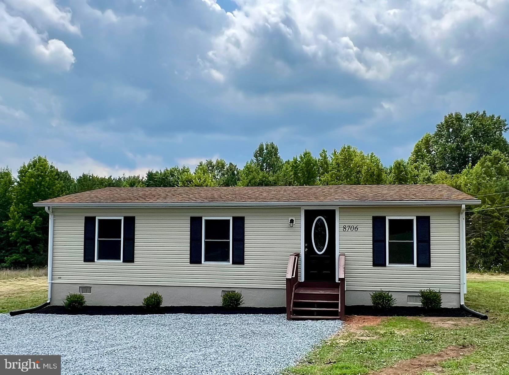 a front view of house with yard