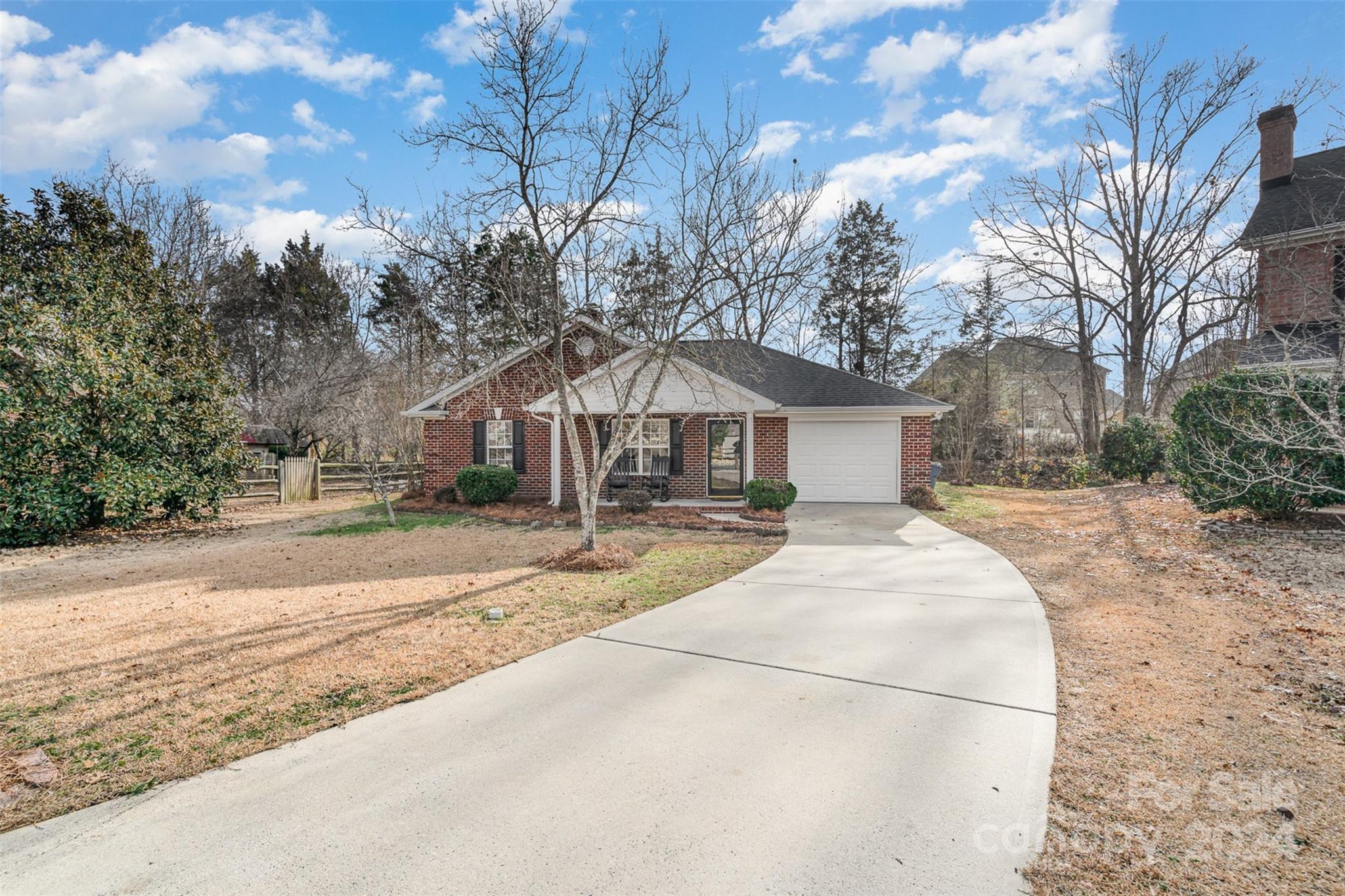 a house with trees in the background