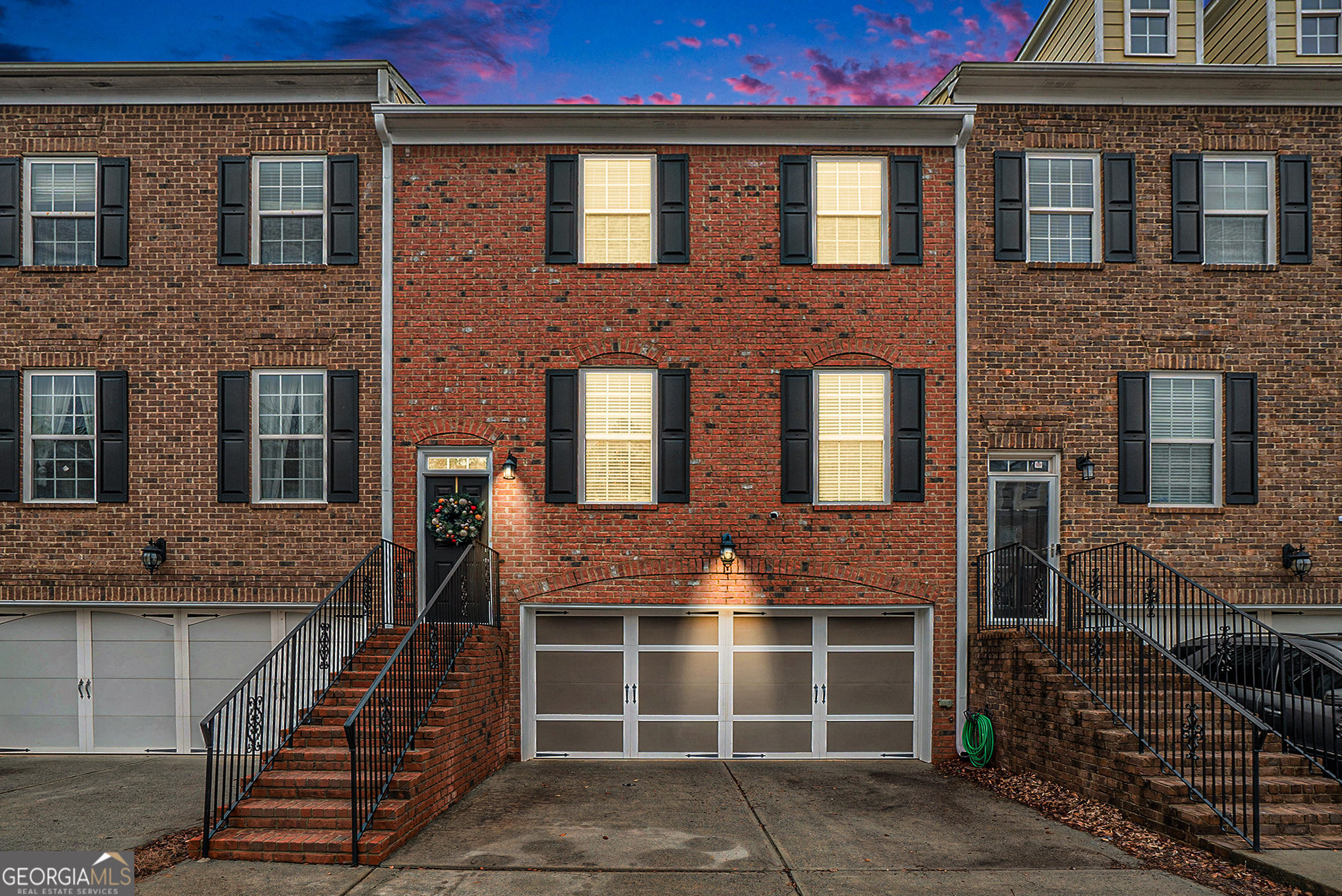 Townhome/Rowhouse property with a garage