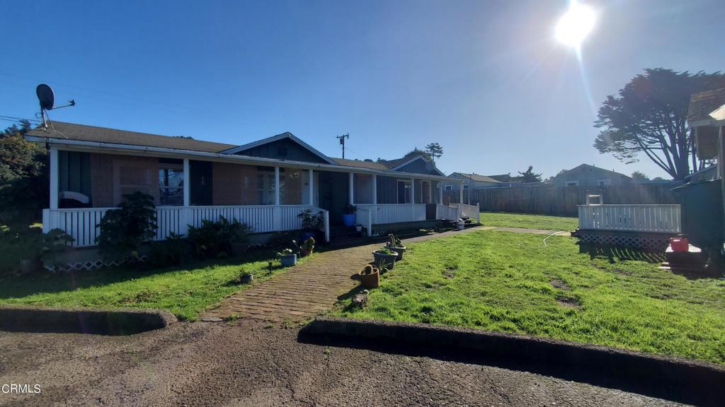 a view of a back yard of the house