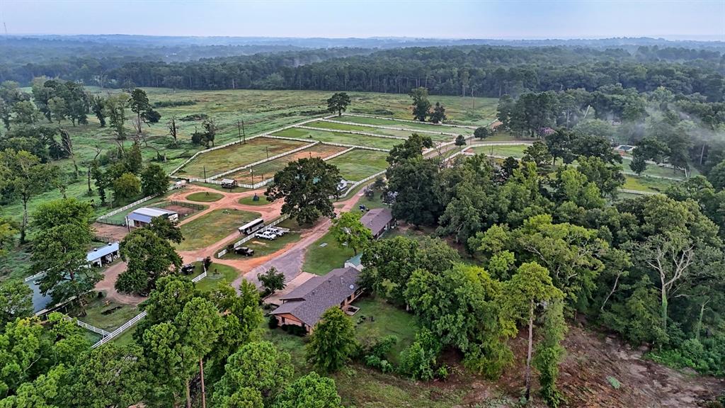 an aerial view of a house with a garden