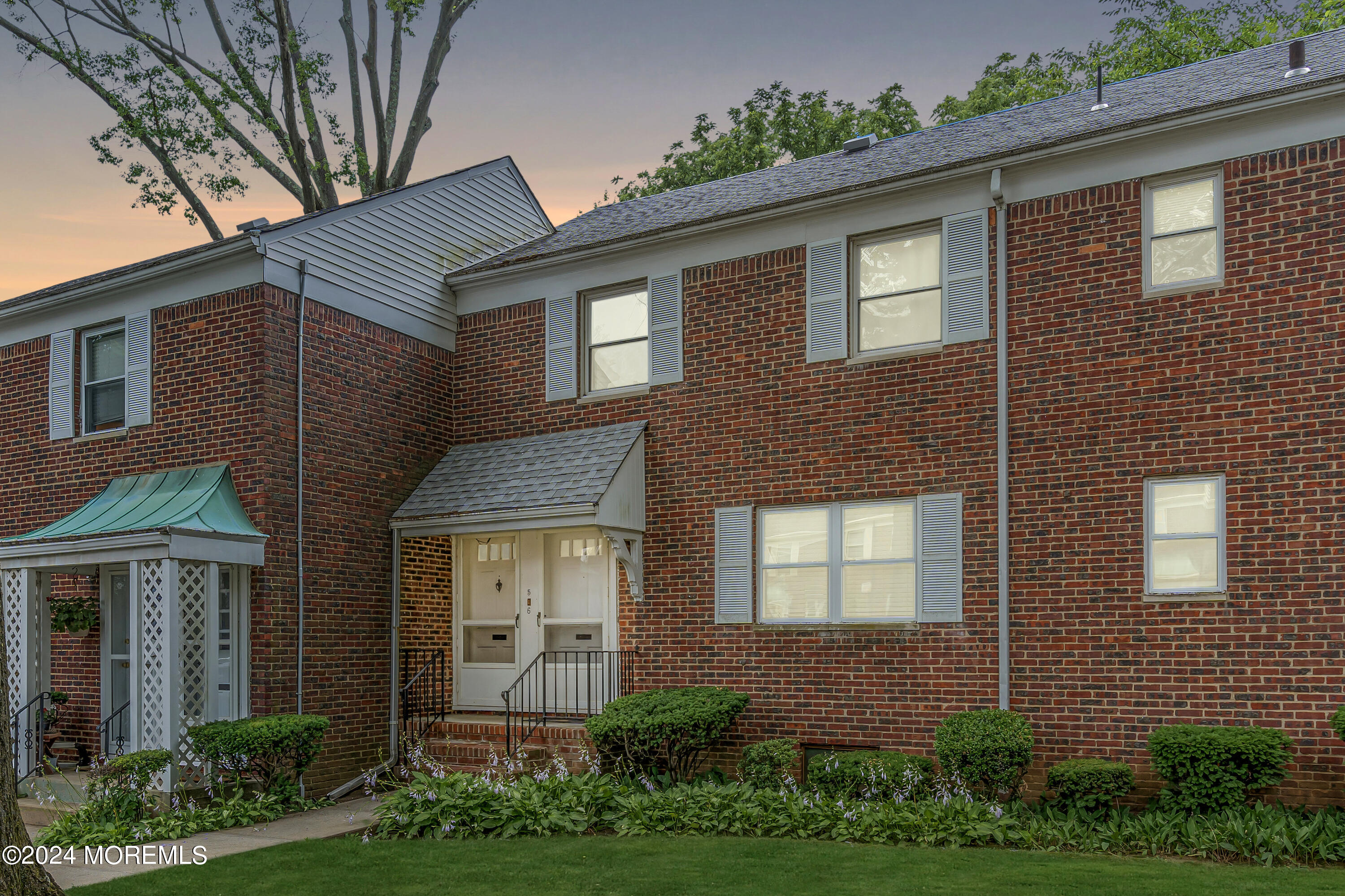 a front view of a house having yard