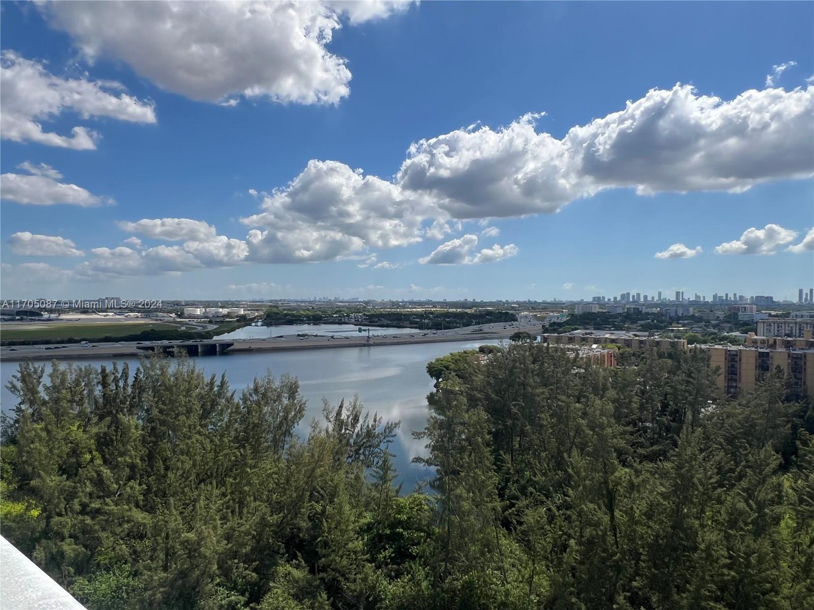 a view of a lake and mountain in back