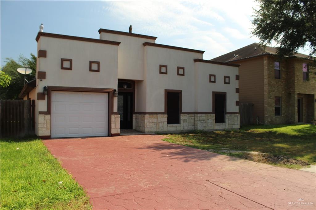 a front view of house with yard