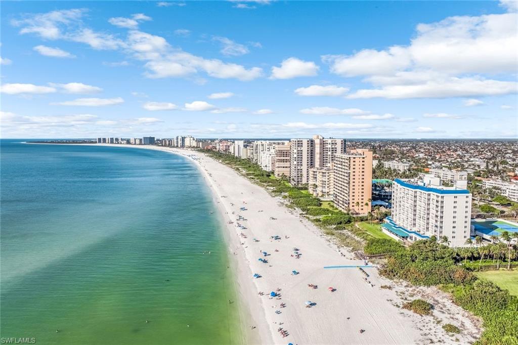 a view of a city with an ocean view