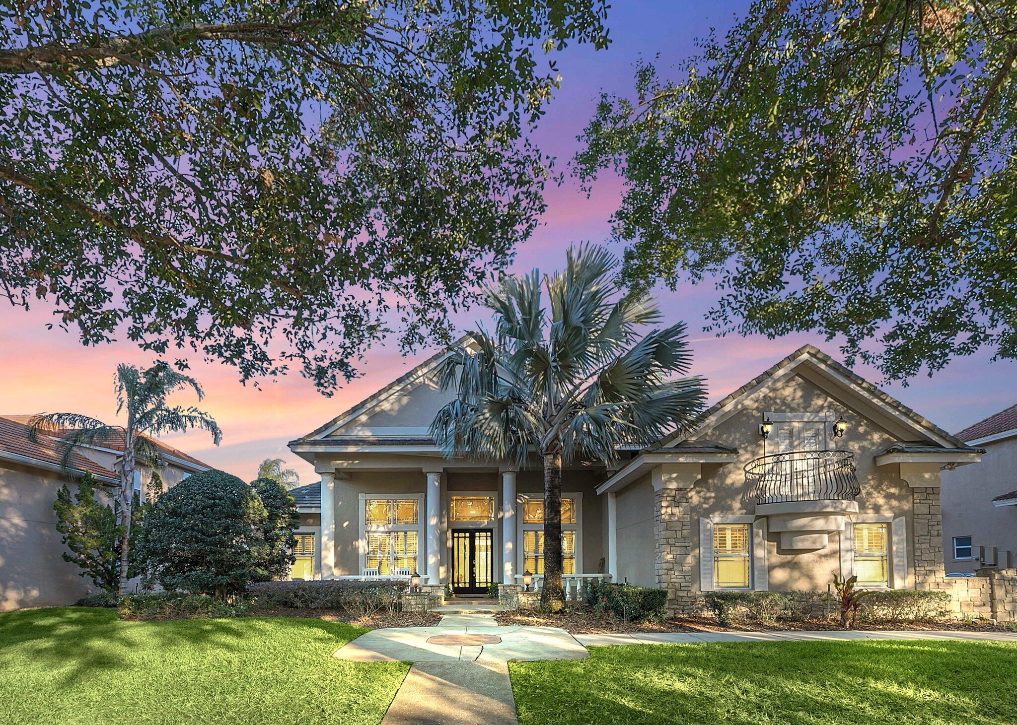 front view of a house with a yard