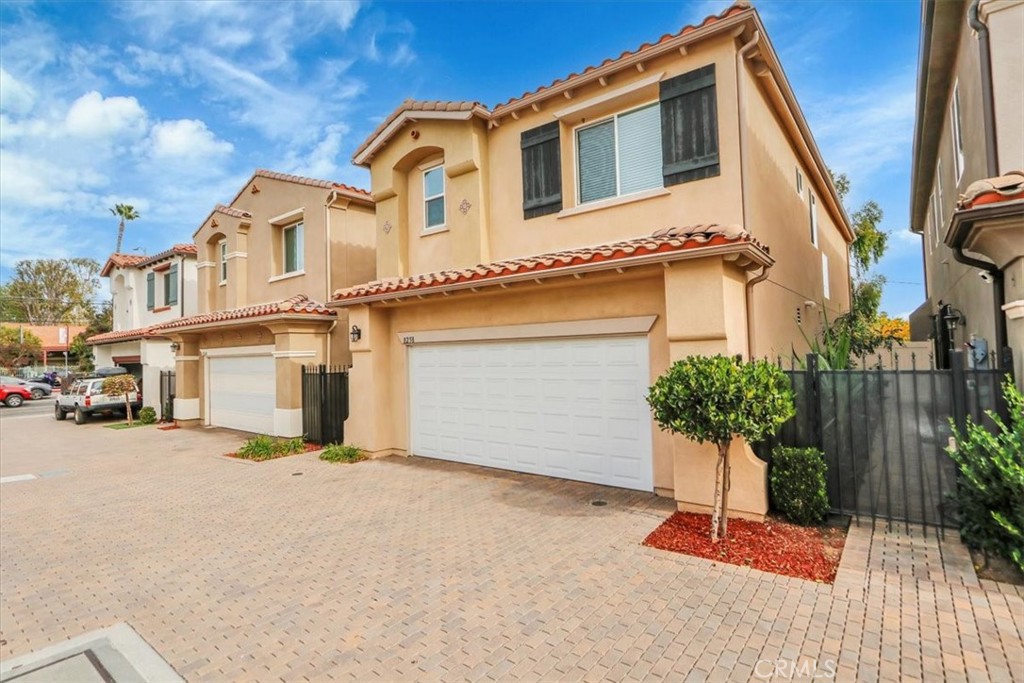 a front view of a house with a garage