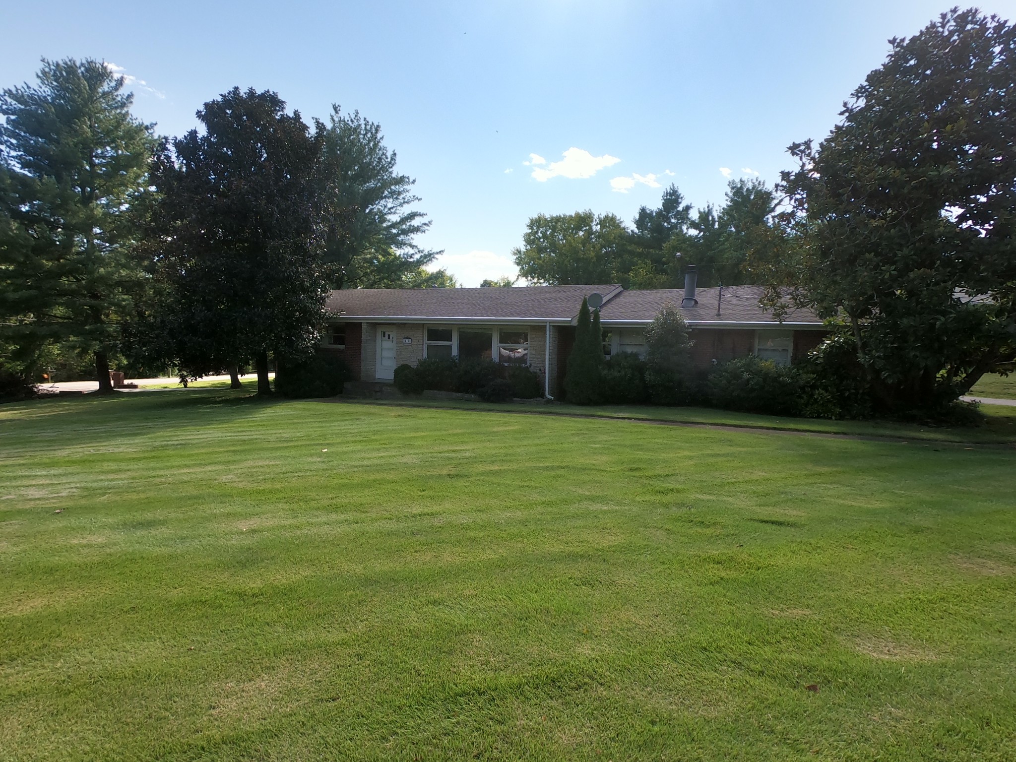 a view of a house with a garden