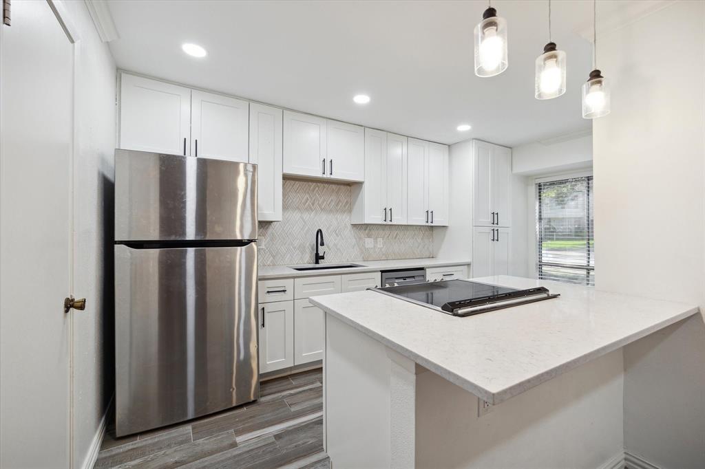 The kitchen is newly renovated, with soft-close cabinets and drawers.