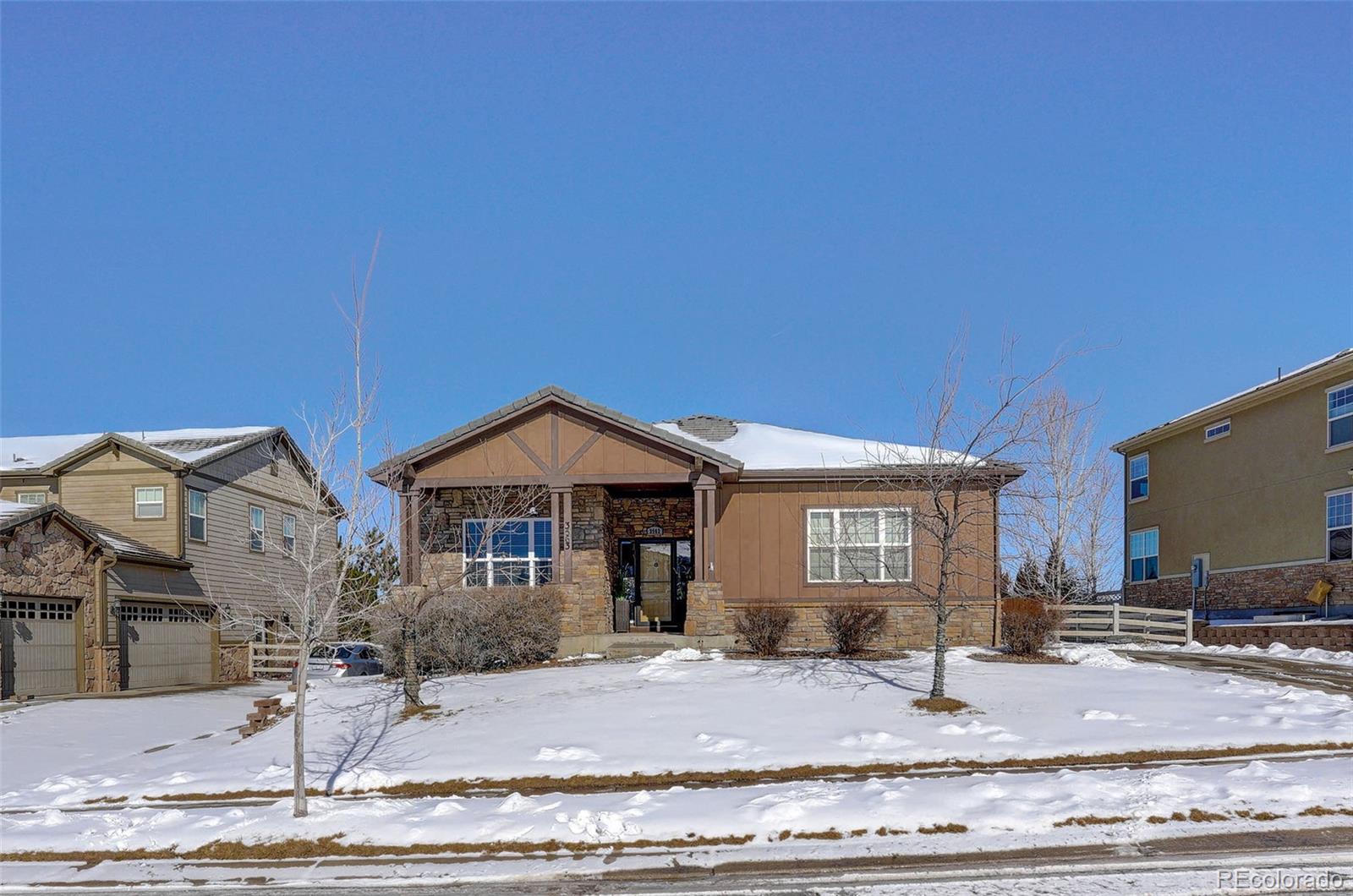 a front view of a house with yard