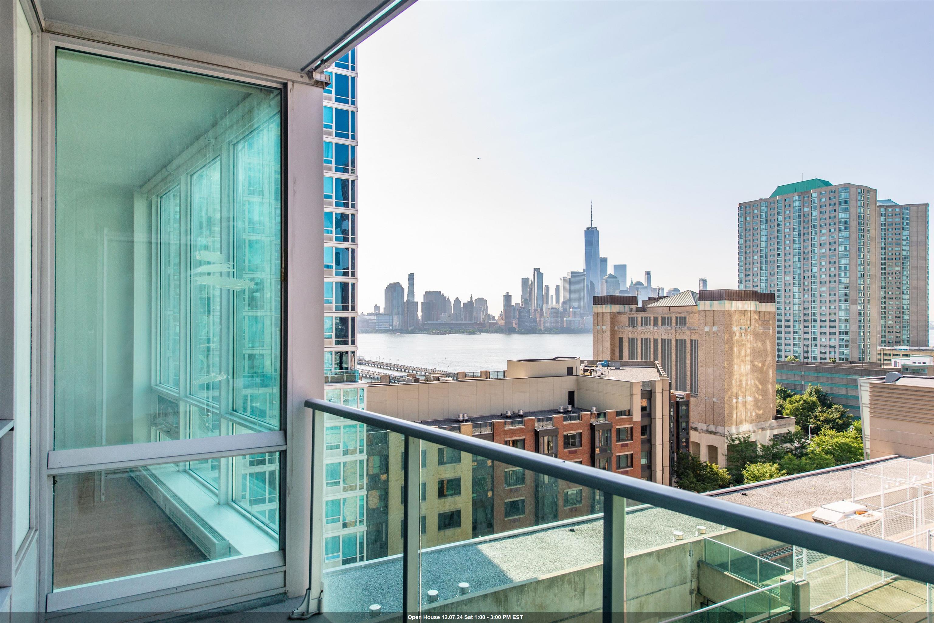 a view of a balcony with city view