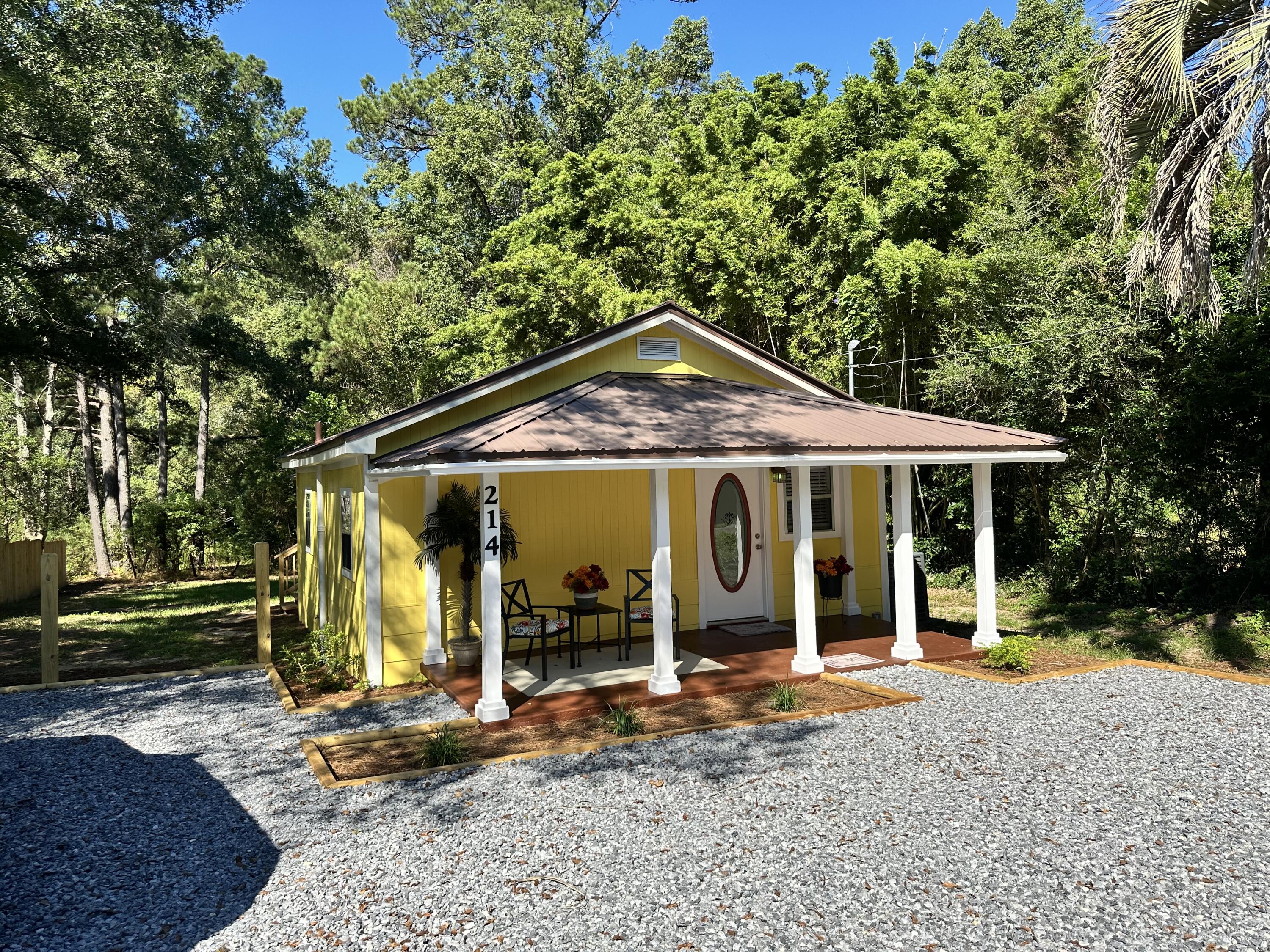 a front view of a house with porch