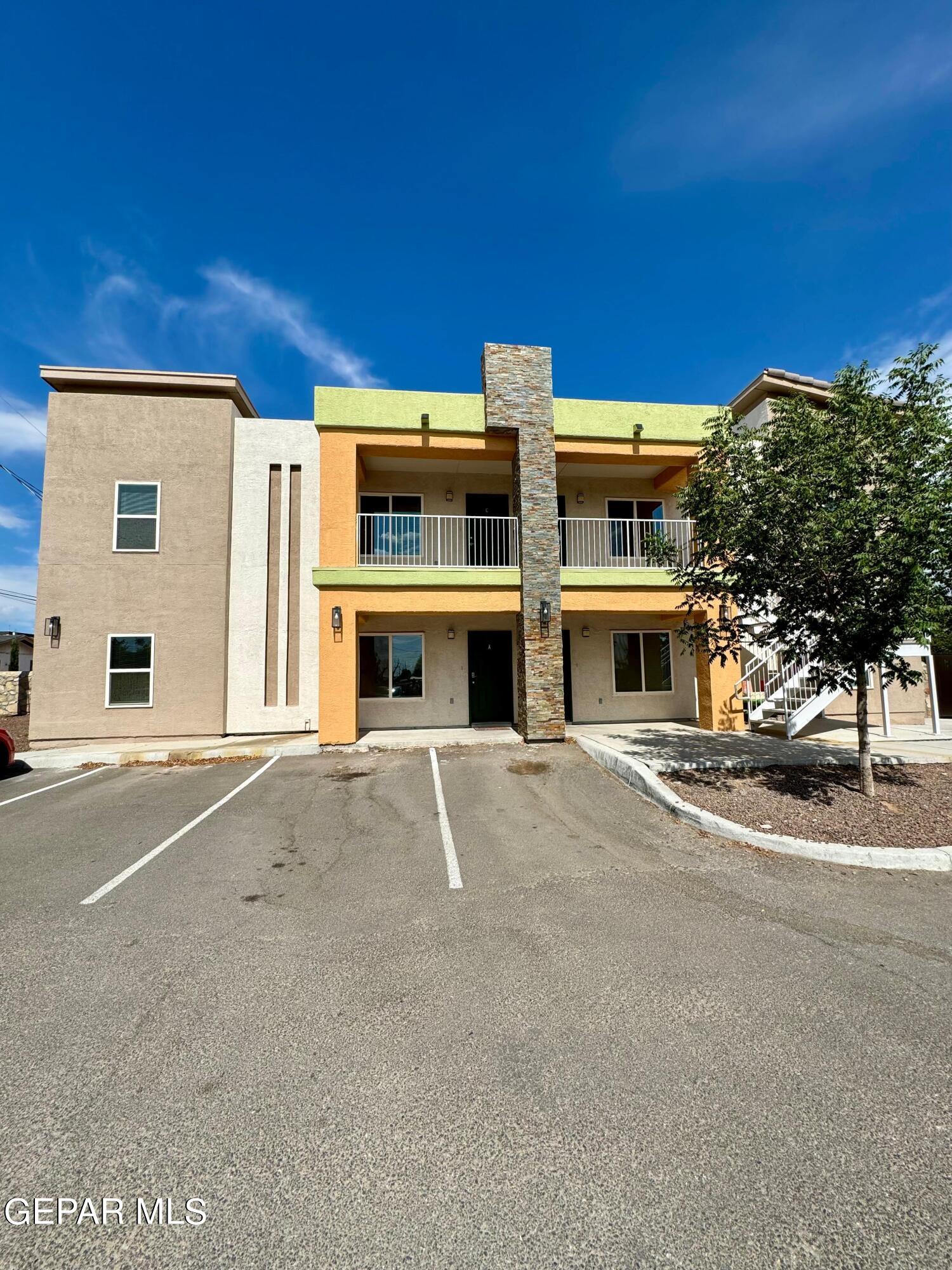 a view of a building with a street