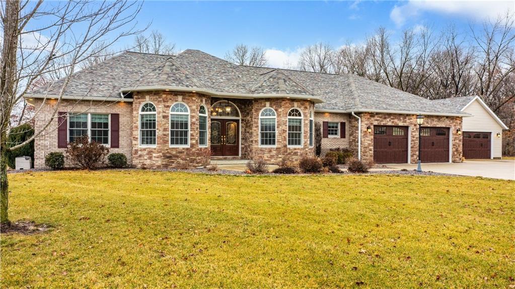 front view of a house with a yard