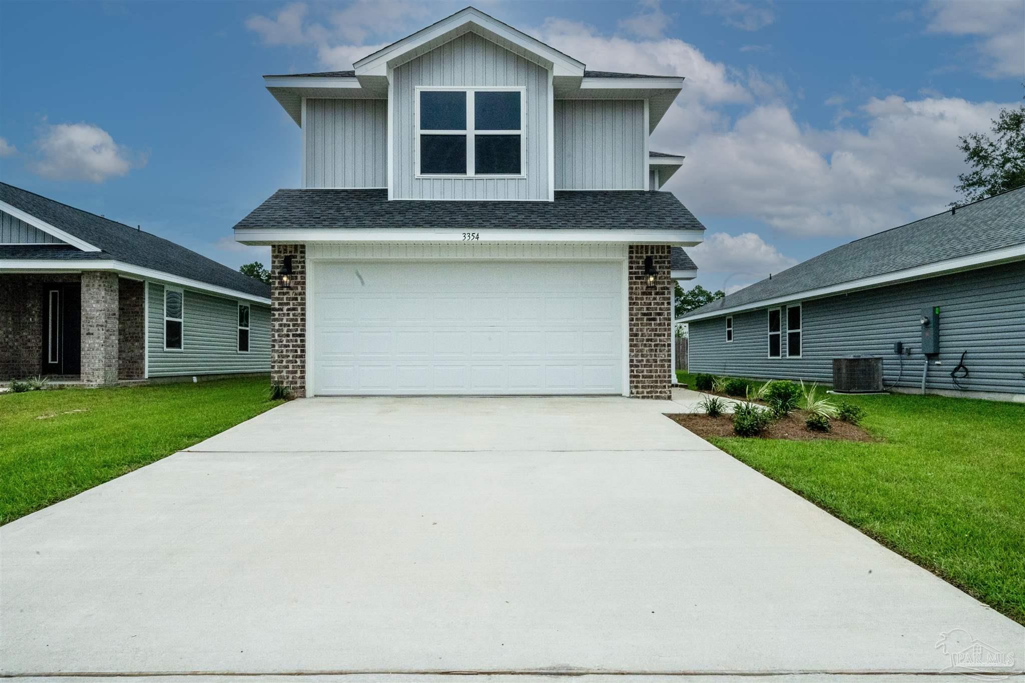 a front view of house with yard