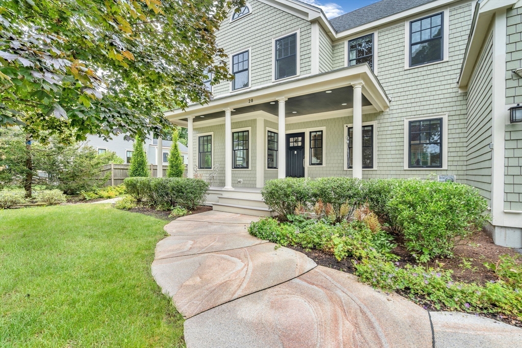 front view of a house and a yard