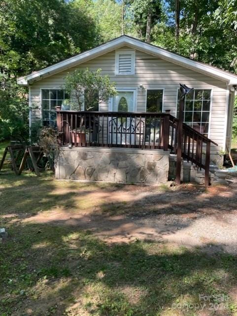 a front view of a house with yard