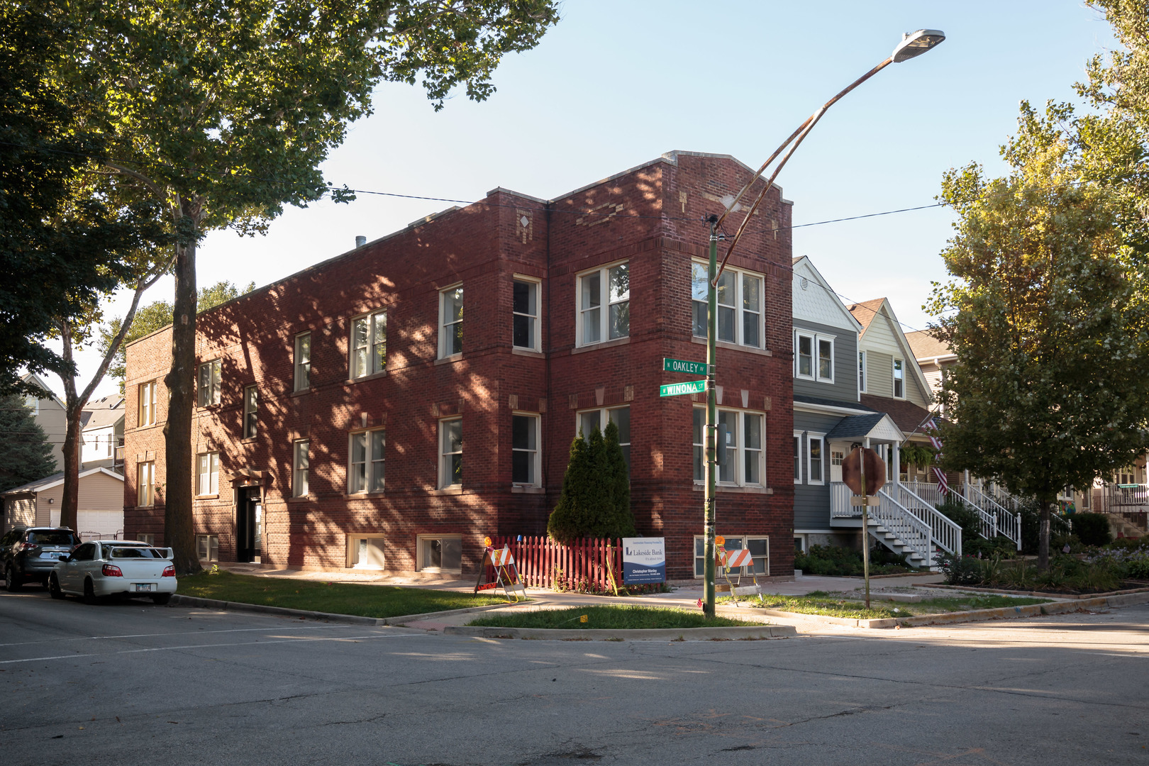 a view of a street in front of a building