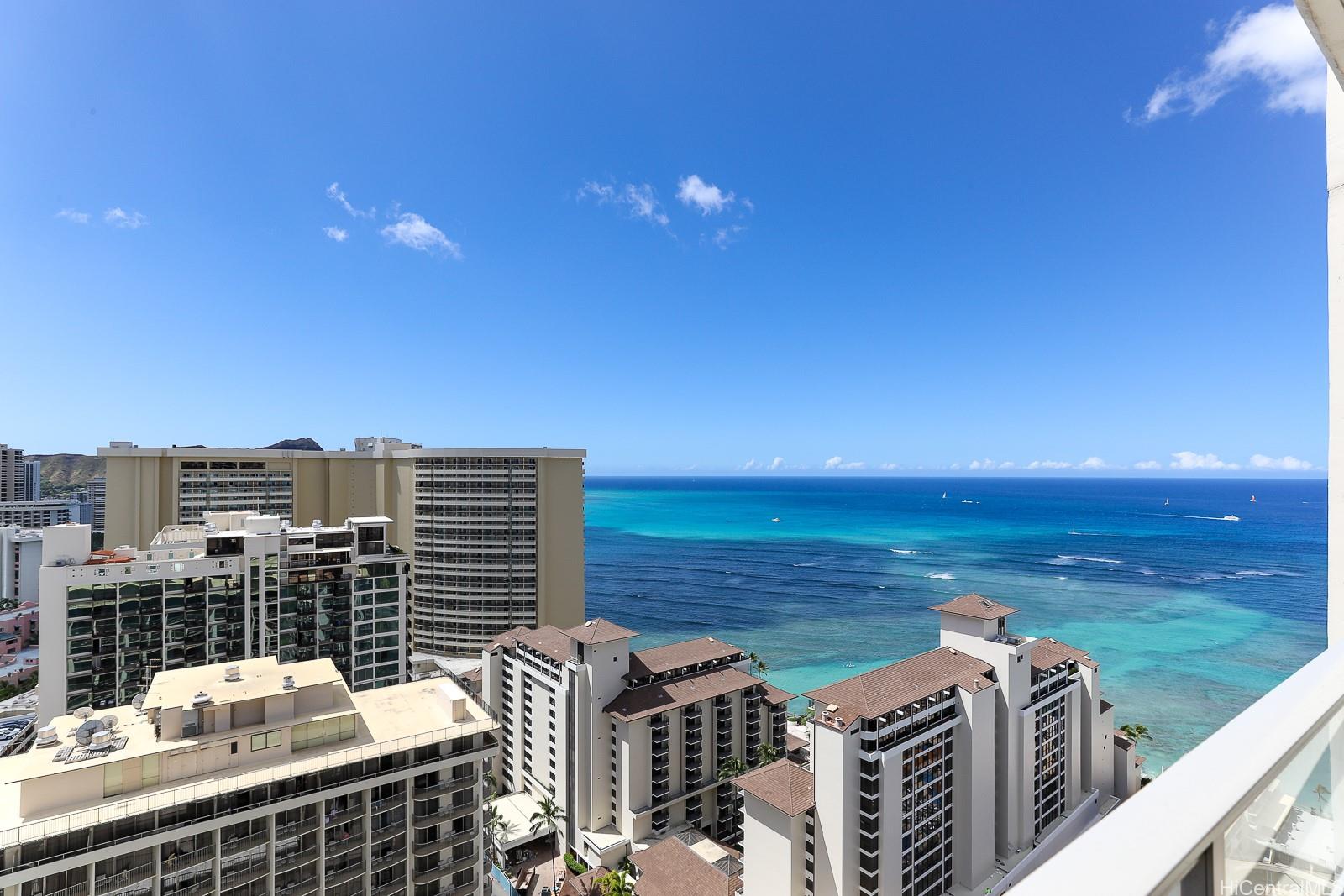 a view of a balcony with an ocean