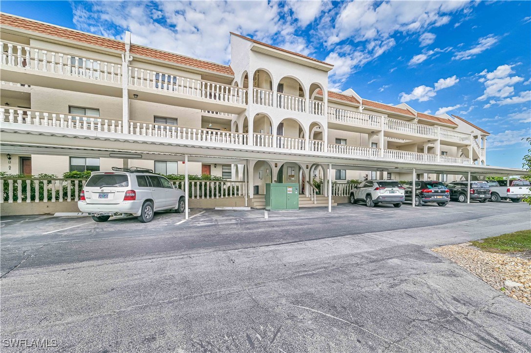 a front view of a building with street view